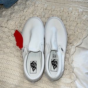 Brand new white slip on vans
